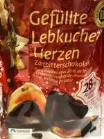 Suhkru kogus sees Lebkuchenherzen, fruchtig gefüllt, überzogen mit Zartbitterschokolade