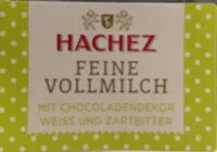 Quantité de sucre dans Edelvollmilchschokolade mit weißer und Zartbitterschokolade garniert