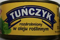 Suhkru kogus sees Tuńczyk rozdrobniony w oleju roślinnym.