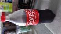 Zuckermenge drin Coca Cola original taste less sugar (Singapour)