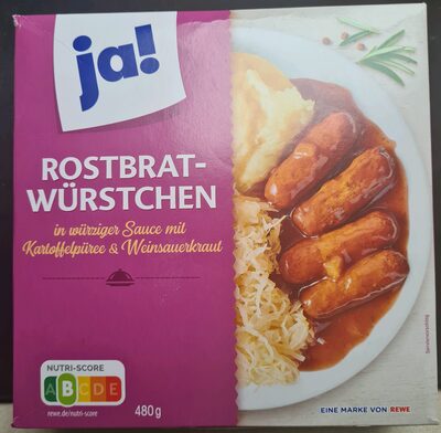 Rostbratwürstchen in würziger sauce mit kartoffelpüree und weinsauerkraut